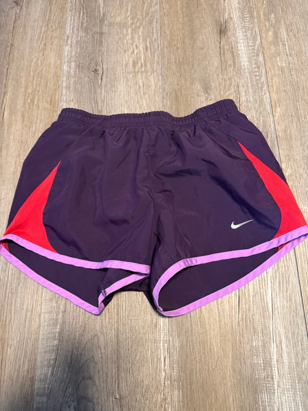 Nike Women's Purple Athletic Shorts with Pink Trim and Red Accents
